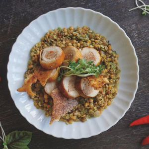 Rolled chicken with pork mince, lentils